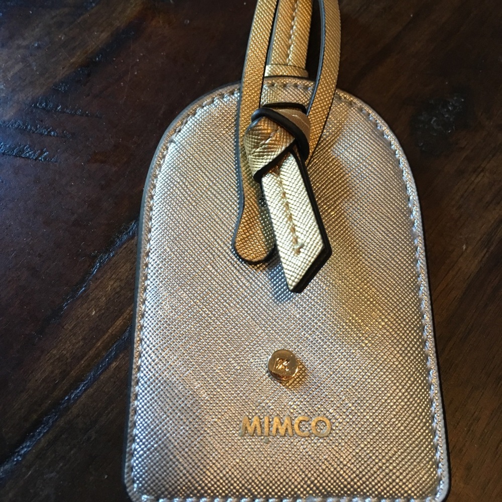 NWOT mimco luggage tag